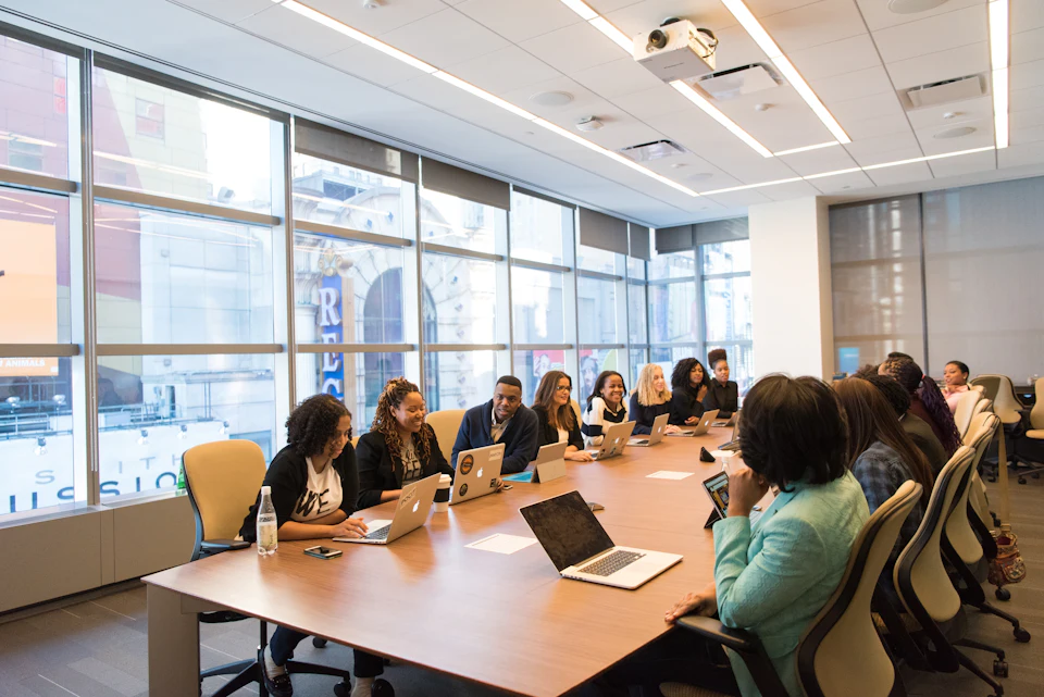 Executives meeting around a long conference table